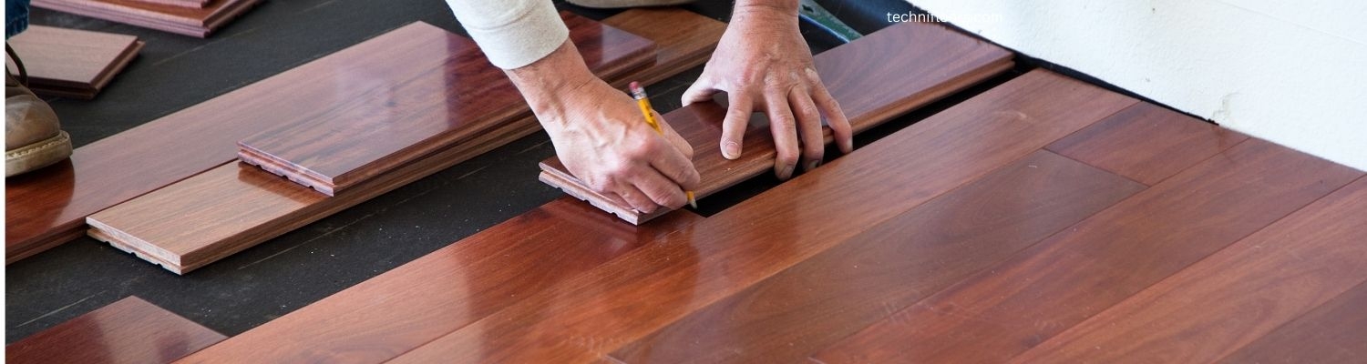 Technicians installing commercial flooring in a high-rise lobby